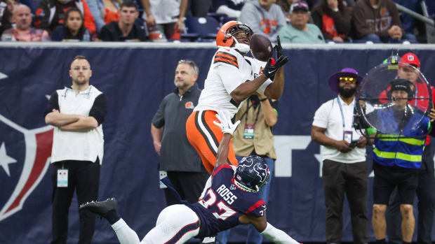 Browns wide receiver Amari Cooper makes a reception and scores a touchdown as Houston Texans cornerback D'Angelo Ross defends during the second quarter at NRG Stadium.