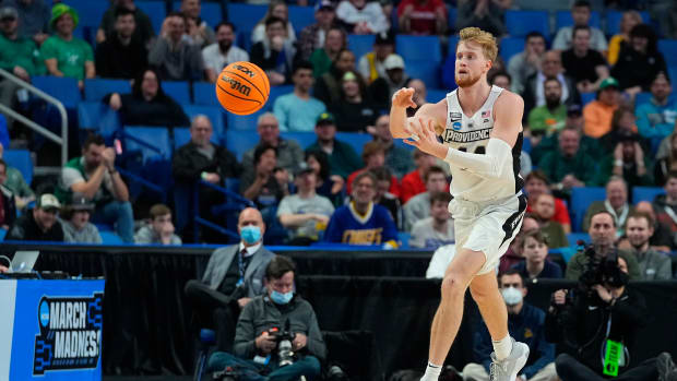 Mar 17, 2022; Buffalo, NY, USA; Providence Friars forward Noah Horchler (14) passes the ball against the South Dakota State Jackrabbits in the first half during the first round of the 2022 NCAA Tournament at KeyBank Center. Mandatory Credit: Gregory Fisher-USA TODAY Sports