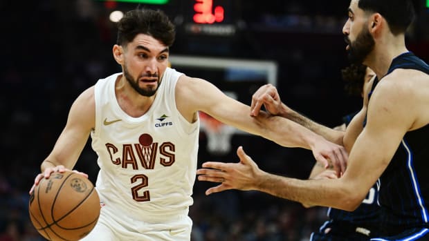 Oct 12, 2023; Cleveland, Ohio, USA; Cleveland Cavaliers guard Ty Jerome (2) drives to the basket against Orlando Magic center Goga Bitadze (35) during the second half at Rocket Mortgage FieldHouse.