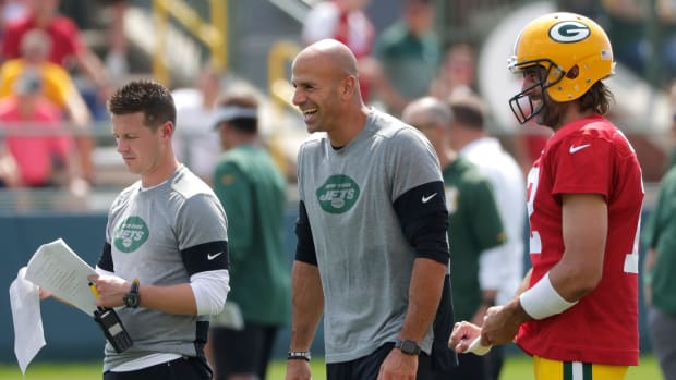 Robert Saleh and Aaron Rodgers at a joint training camp practice in 2021