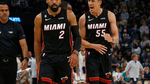 Heat guard Duncan Robinson celebrates with teammate Gabe Vincent.