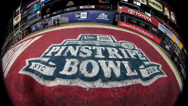 The Pinstripe Bowl logo shown after the Badgers beat Miami