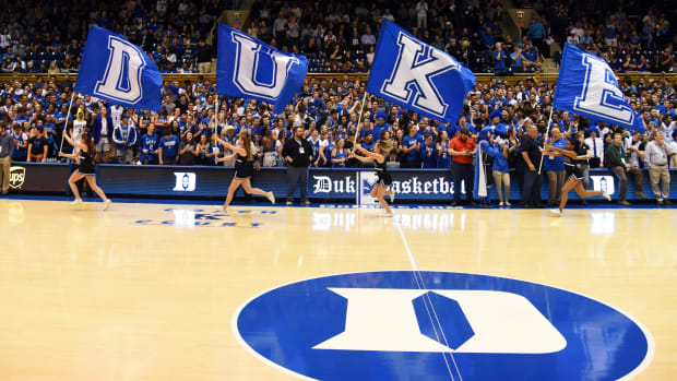 Duke Blue Devils cheerleaders take the floor prior to a basketball game at Cameron Indoor Stadium.