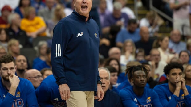 Mar 13, 2024; Kansas City, MO, USA; Kansas Jayhawks head coach Bill Self yells from the sideline during the first half against the Cincinnati Bearcats at T-Mobile Center