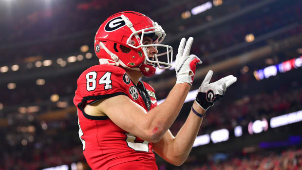 Georgia Bulldogs wide receiver Ladd McConkey celebrates during a college football game in the SEC.