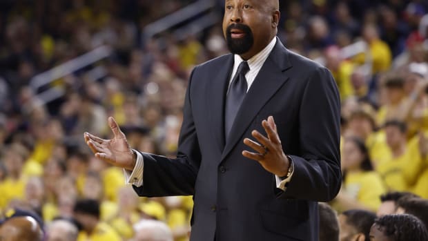 Coach Mike Woodson reacts during the first half against the Michigan Wolverines at Crisler Center.