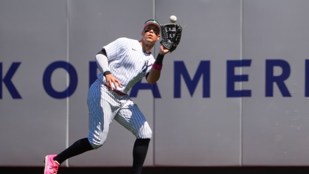 New York Yankees right fielder Aaron Judge catches a fly ball.