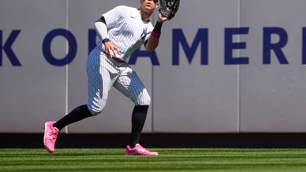 New York Yankees right fielder Aaron Judge catches a fly ball.