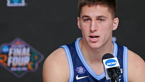 Villanova Wildcats guard Collin Gillespie (2) talks to media during a press conference before the 2022 NCAA men's basketball tournament Final Four semifinals at Caesars Superdome.