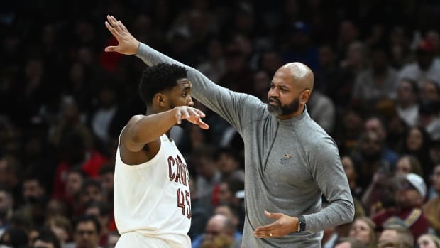 Feb 11, 2023; Cleveland, Ohio, USA; Cleveland Cavaliers head coach J.B. Bickerstaff talks to guard Donovan Mitchell (45) during the second half against the Chicago Bulls at Rocket Mortgage FieldHouse. Mandatory Credit: Ken Blaze-USA TODAY Sports