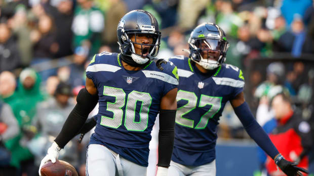Seattle Seahawks cornerback Mike Jackson (30) celebrates following an interception against the New York Jets during the fourth quarter at Lumen Field.