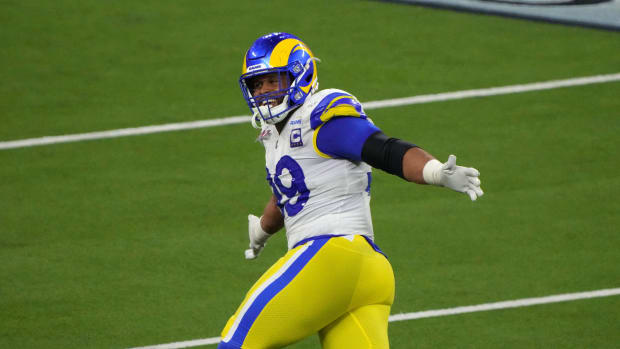 Aaron Donald celebrates a tackle during a game.
