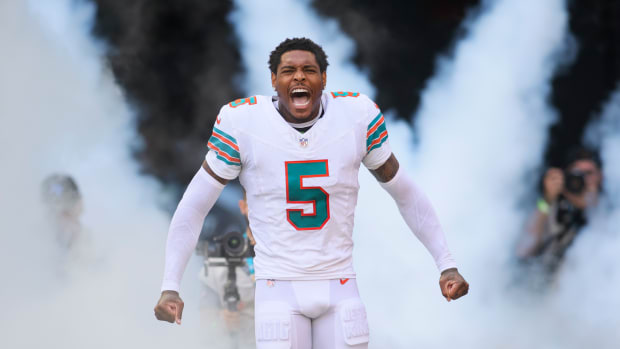 Miami Dolphins cornerback Jalen Ramsey runs onto the field before a game.