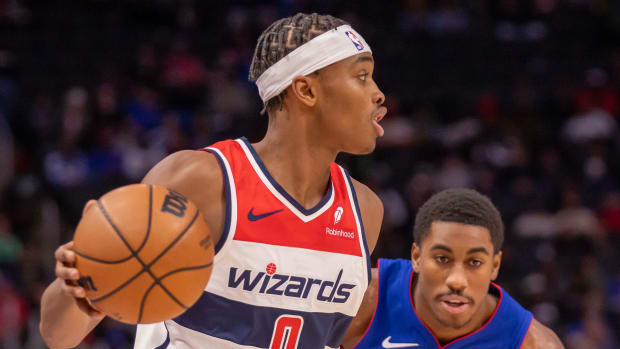 Washington Wizards guard Bilal Coulibaly (0) controls the ball in front of Detroit Pistons guard Jaden Ivey (23) during the second half at Little Caesars Arena.
