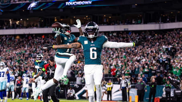 Philadelphia Eagles wide receiver DeVonta Smith (6) and wide receiver A.J. Brown (11) celebrate a touchdown against the Dallas Cowboys during the third quarter at Lincoln Financial Field.