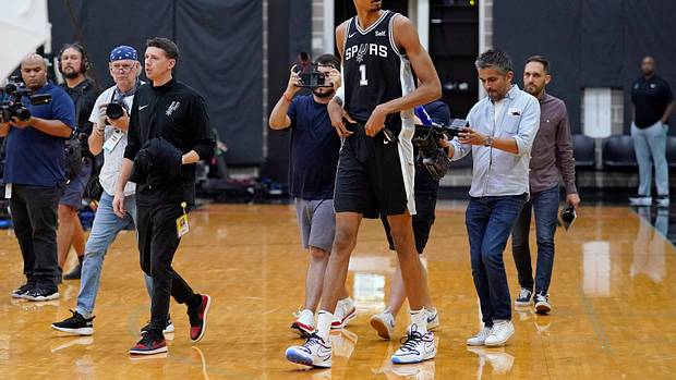 San Antonio Spurs center Victor Wembanyama enters the court during Media Day.