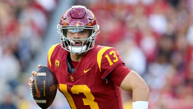 USC Trojans quarterback Caleb Williams (13) scrambles during the second quarter against the UCLA Bruins at United Airlines Field at Los Angeles Memorial Coliseum.