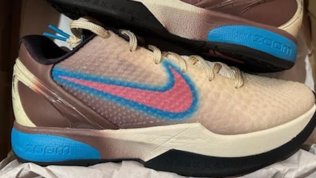 View of grey, pink, and blue Kobe shoes.