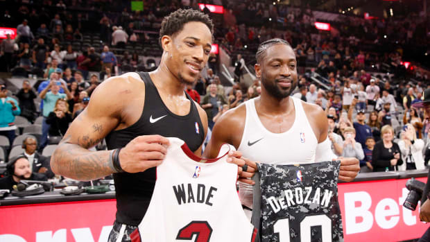 Mar 20, 2019; San Antonio, TX, USA; DeMar DeRozan and Dwyane Wade exchange jerseys after the game at AT&T Center.