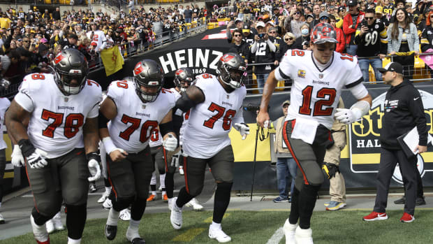 Tampa Bay Buccaneers quarterback Tom Brady (12) and his offensive line take the field against the Pittsburgh Steelers.