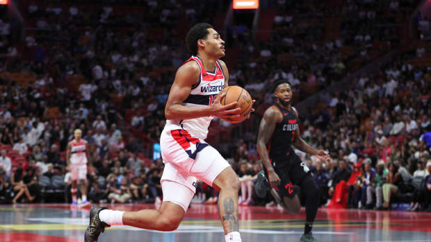 Washington Wizards guard Jordan Poole (13) drives to the basket against the Miami Heat during the first quarter at Kaseya Center.