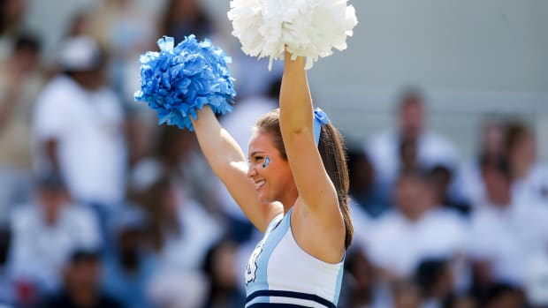 North Carolina Tar Heels cheerleader at a college football game.