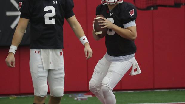Reserve quarterbacks Myles Burkett and Chase Wolf.