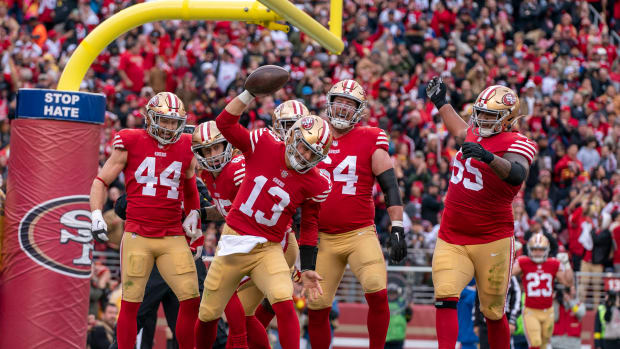 San Francisco 49ers quarterback Brock Purdy (13) celebrates after scoring a touchdown against the Tampa Bay Buccaneers during the second quarter at Levi's Stadium. Mandatory Credit: Kyle Terada-USA TODAY Sports