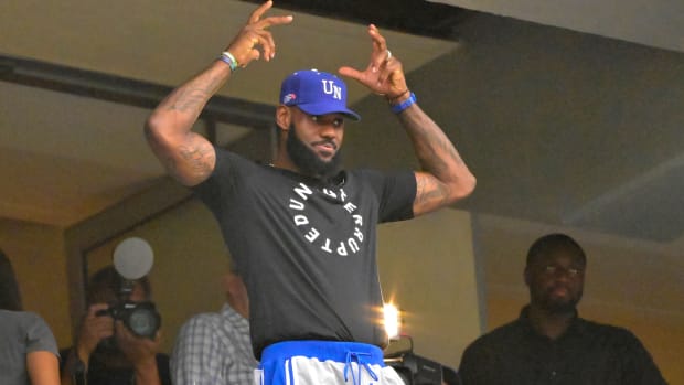 LeBron James acknowledges the crowd at the Los Angeles Dodgers game.