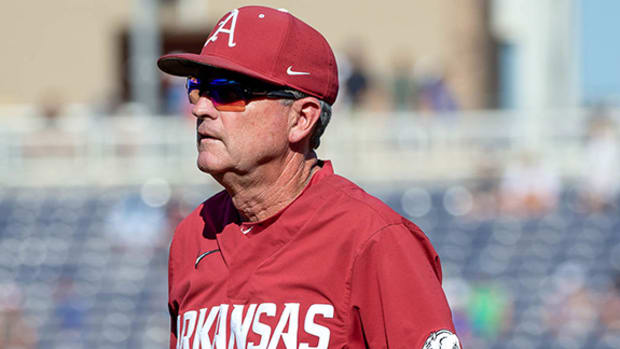 Razorbacks coach Dave Van Horn on the field before a game in the College World Series in Omaha against eventual national champion Ole Miss.