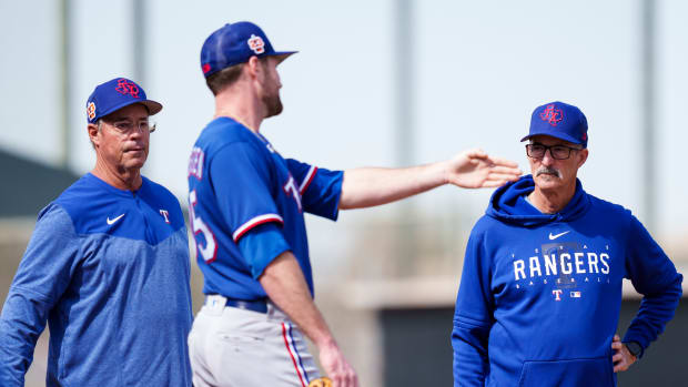 Hall of Famer Greg Maddux, left, with his brother, Texas Rangers pitching coach Mike Maddux, right, has been invited by manager Bruce Bochy to visit spring training to help instruct pitchers. Greg Maddux has often helped instruct pitchers during spring training while his brother has been a Rangers coach.