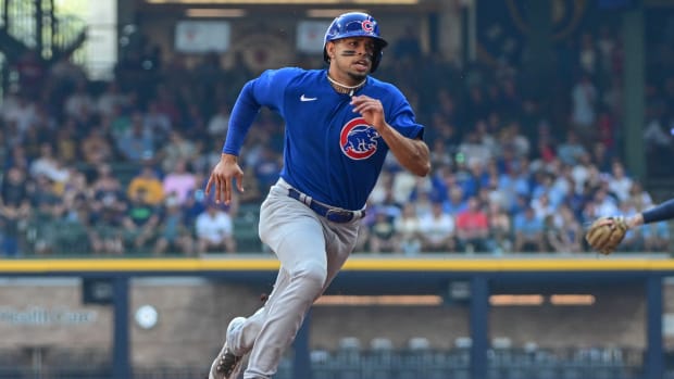 Oct 1, 2023; Milwaukee, Wisconsin, USA; Chicago Cubs shortstop Christopher Morel (5) advances to third base after a single in the first inning against the Milwaukee Brewers at American Family Field.