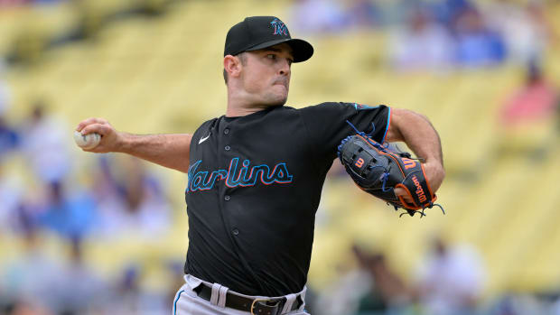Former Miami Marlins relief pitcher David Robertson throws to the plate in the eighth inning against the Los Angeles Dodgers at Dodger Stadium.