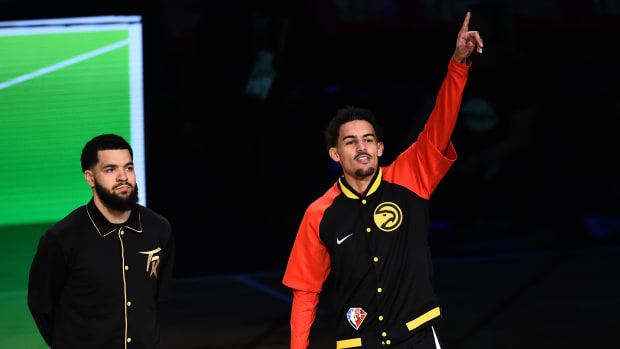 Feb 19, 2022; Cleveland, OH, USA; Atlanta Hawks player Trae Young and Toronto Raptors Fred VanVleet are announced before participating in the three point contest during the 2022 NBA All-Star Saturday Night at Rocket Mortgage Field House.