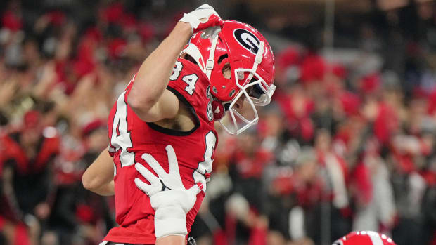 Georgia Bulldogs wide receiver Ladd McConkey celebrates a touchdown during a college football game in the SEC.