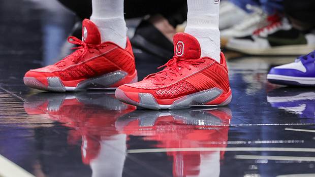 Minnesota Timberwolves guard Mike Conley's scarlet and grey Air Jordan sneakers.