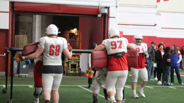 The Wisconsin defensive line working on individual drills during spring practice.