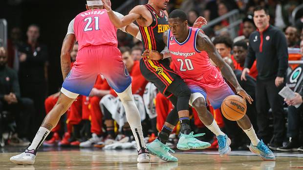 Washington Wizards guard Kendrick Nunn drives on Atlanta Hawks guard Trae Young
