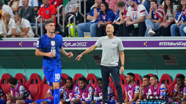 USA coach Gregg Berhalter directs his team during a match.