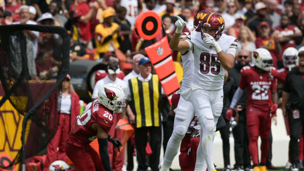 Washington Commanders tight end Cole Turner (85) reacts after catching a pass form first down during the first half against the Arizona Cardinals at FedExField.