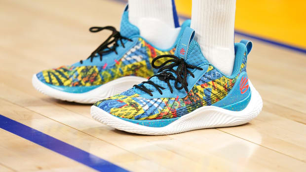 View of Stephen Curry's blue and orange shoes.