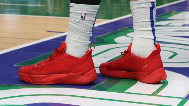 View of Luka Doncic's red Jordan shoes.