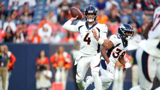 Denver Broncos quarterback Jarrett Stidham (4) pass in the first quarter against the against the Los Angeles Rams at Empower Field at Mile High.