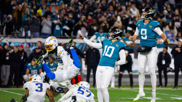Jan 14, 2023; Jacksonville, Florida, USA; Jacksonville Jaguars kicker Riley Patterson (10) and punter Logan Cooke (9) react after the winning field goal as time expired against the Los Angeles Chargers in the fourth quarter during a wild card game at TIAA Bank Field. Mandatory Credit: Mark J. Rebilas-USA TODAY Sports  
