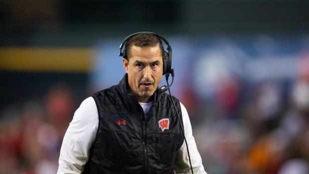 Wisconsin head coach Luke Fickell wearing a headset in the Guaranteed Rate Bowl against Oklahoma State.