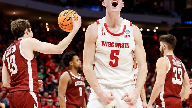 Wisconsin forward Tyler Wahl reacts to a big basket against Colgate.