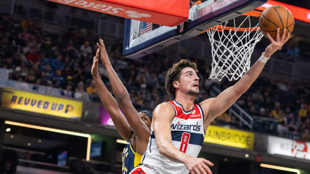 Washington Wizards forward Deni Avdija (8) shoots the ball while Indiana Pacers center Myles Turner (33) defends in the second quarter at Gainbridge Fieldhouse. 