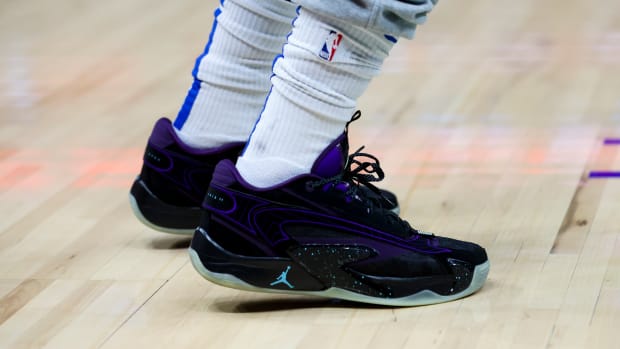 View of Luka Doncic's black and purple Jordan sneakers.