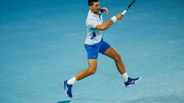 Novak Djokovic hits a shot at the 2024 Australian Open.