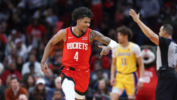 Rockets guard Jalen Green celebrates after scoring a basket during the third quarter against the Los Angeles Lakers at Toyota Center.